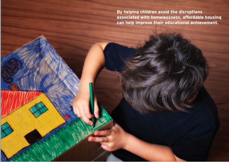 kid_with_colors_and_house.JPG